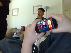 Patrick showing me the Family Guy on his iPhone