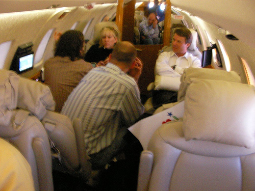 Rielle Hunter sitting next to him)