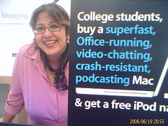 Maryam with a Mac ad at Apple store