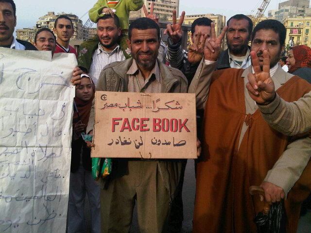 Thank you Facebook, the protester's sign reads