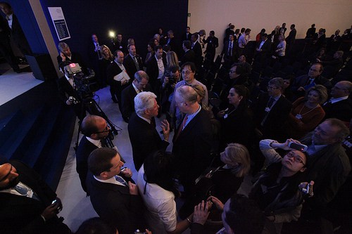David Gergen has a conversation with Bill Clinton on the floor of the World Economic Forum