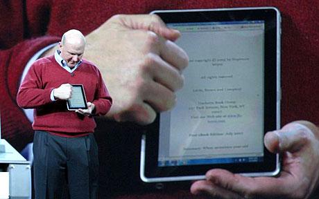 Associated Press image of Steve Ballmer demonstrating a tablet at CES